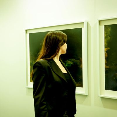 Curated art collection display with professional framing and placement